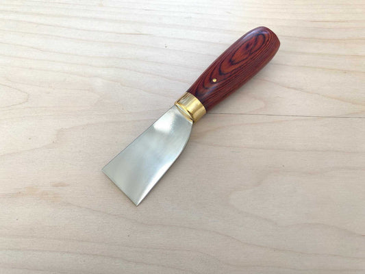 Stainless Steel Japanese Skiving Knife with a wooden handle for leather crafting.