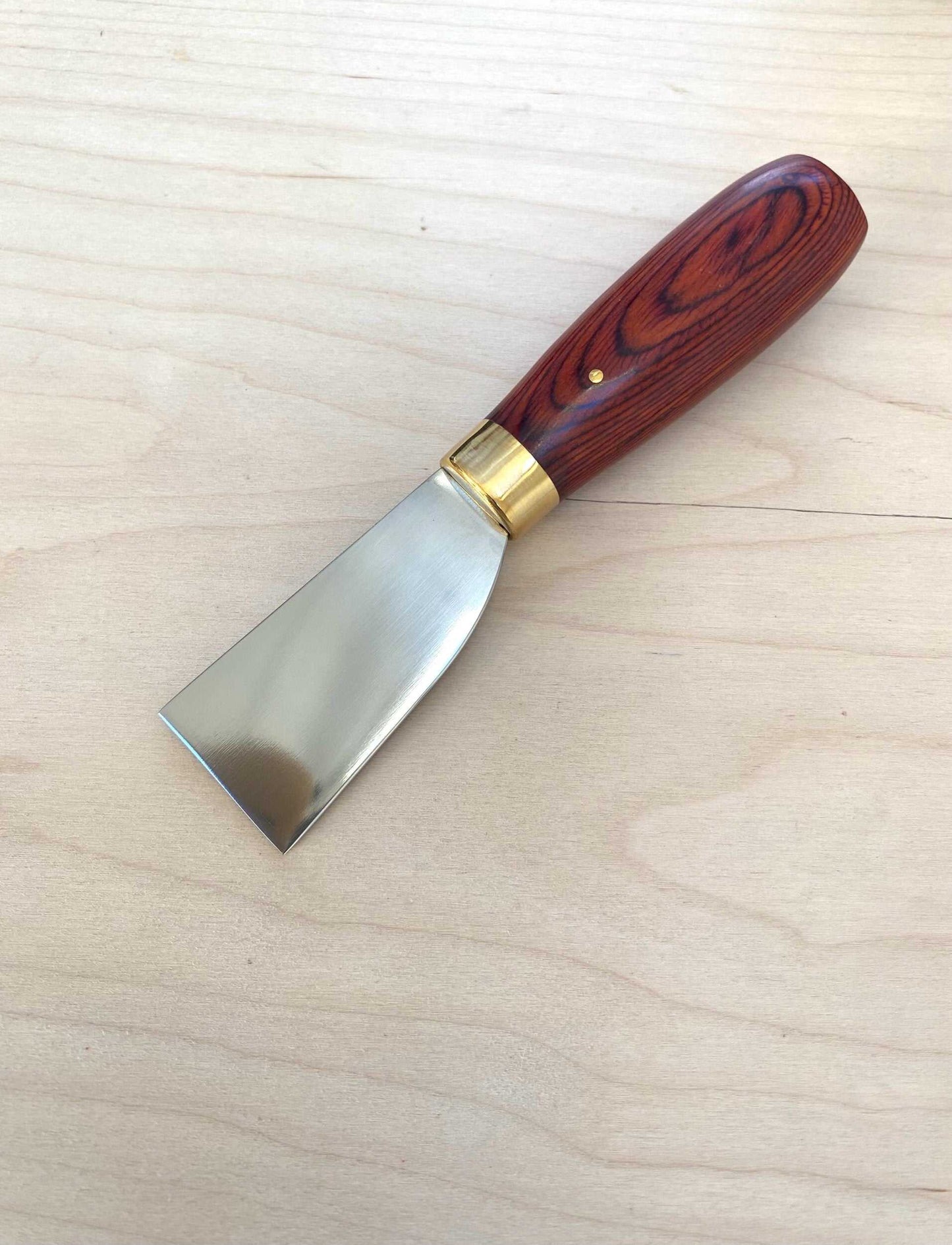 Stainless Steel Japanese Skiving Knife with Wooden Handle for Leather Craftsmanship.