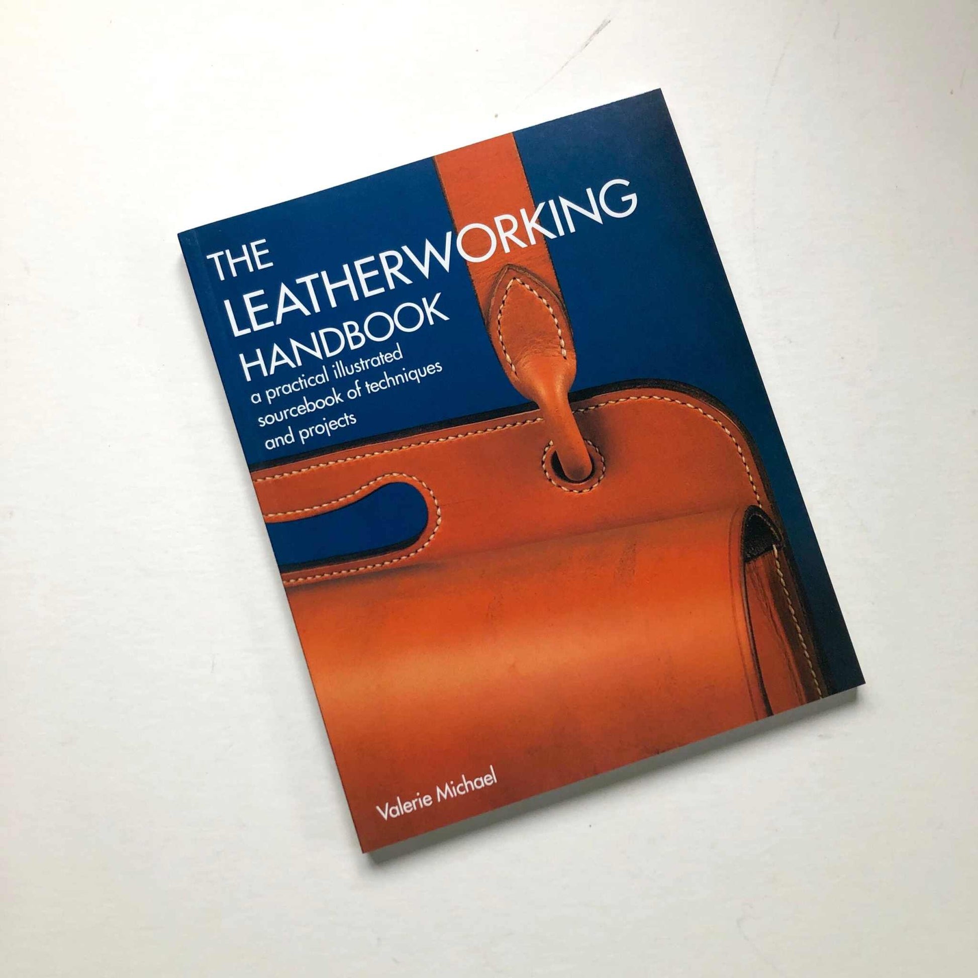 The Leatherworking Handbook by Valerie Michael - Practical illustrated guide for techniques and projects.