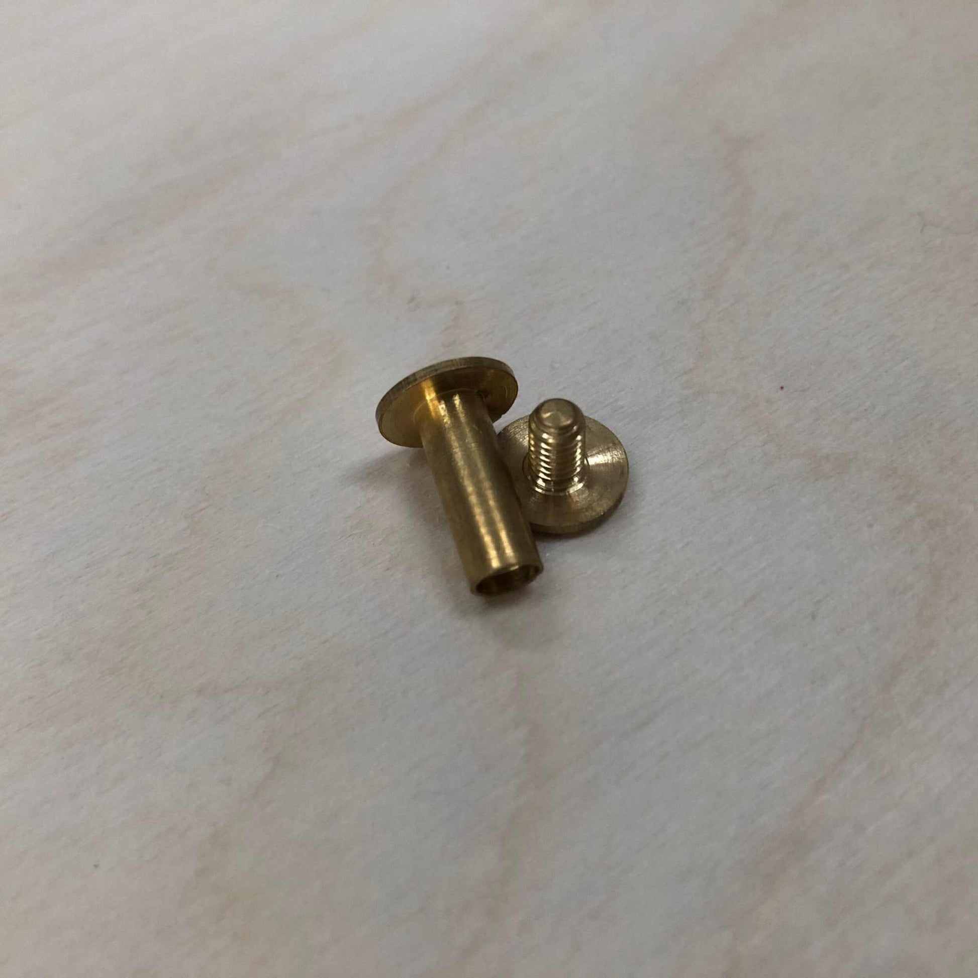 Chicago Screws in Solid Brass or Nickel, precision fasteners for leather crafting and design, available in various sizes.