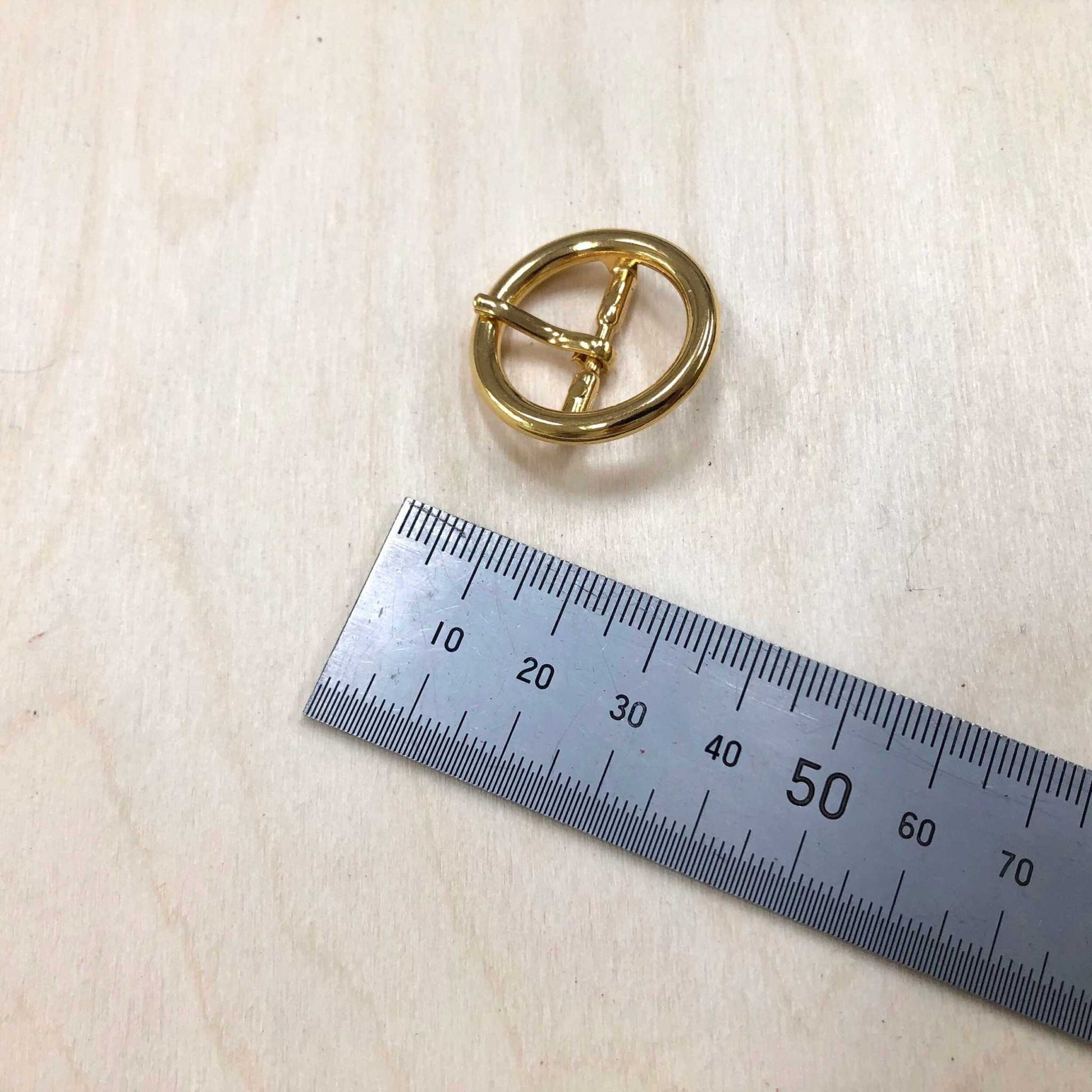 Gold Belt Buckle Circle Frame with pin, suitable for 19mm belts, displayed next to a ruler for size reference.