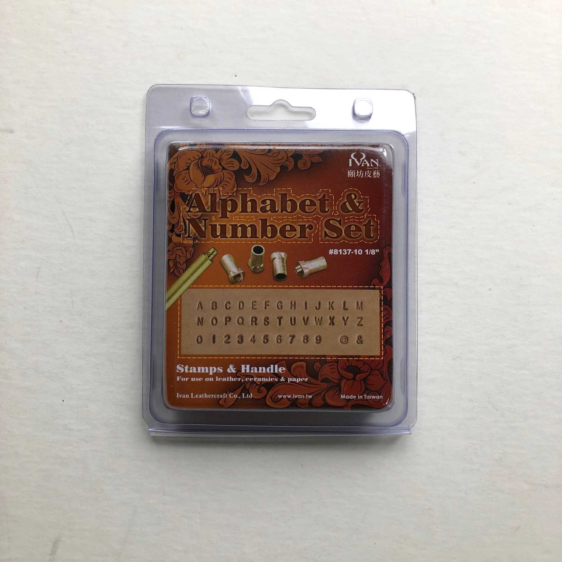 Alphabet Leather Embossing Stamp Set packaging with complete alphabet, numbers, and stamping tool.