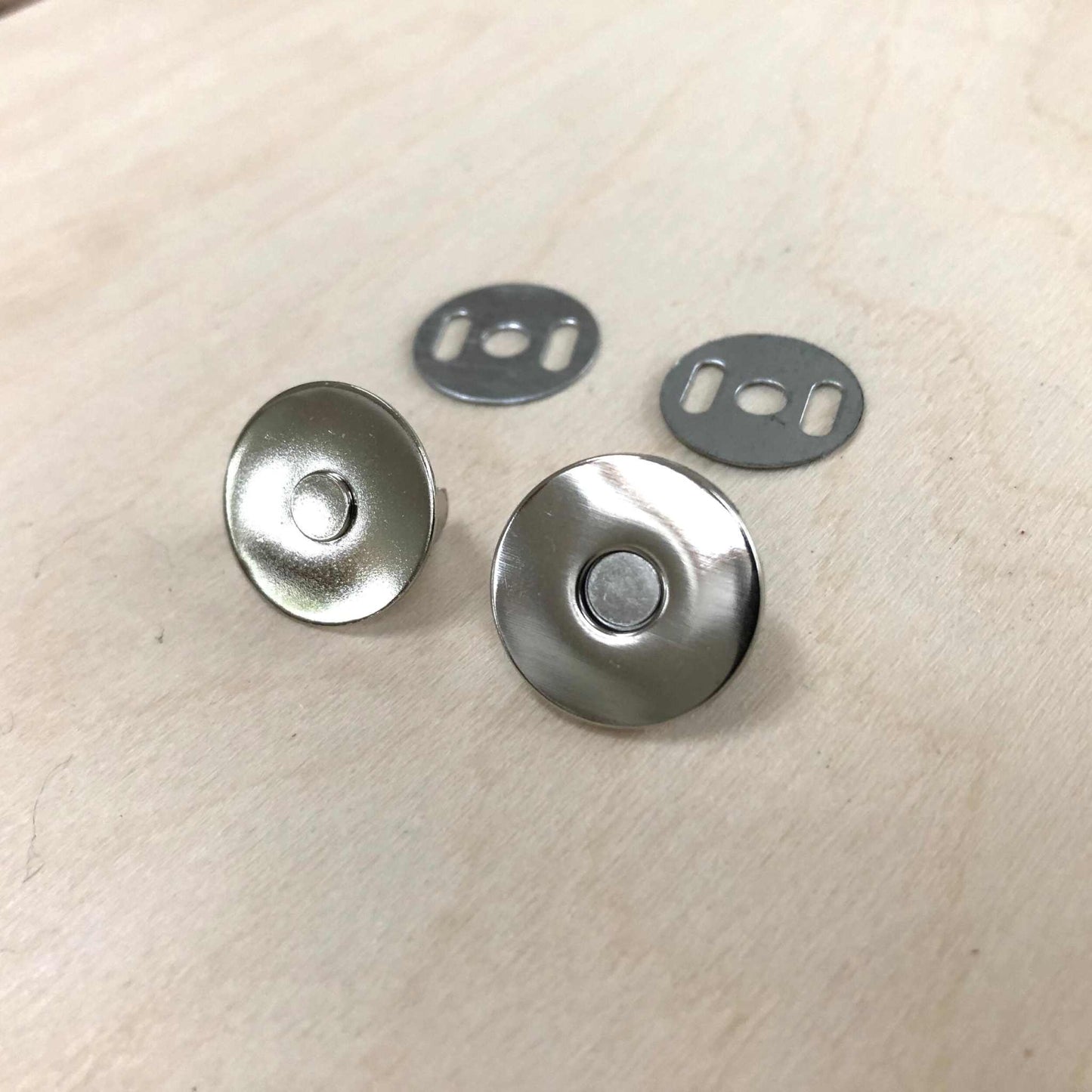 Magnetic Snap Fasteners in silver finish with back plates for crafts.