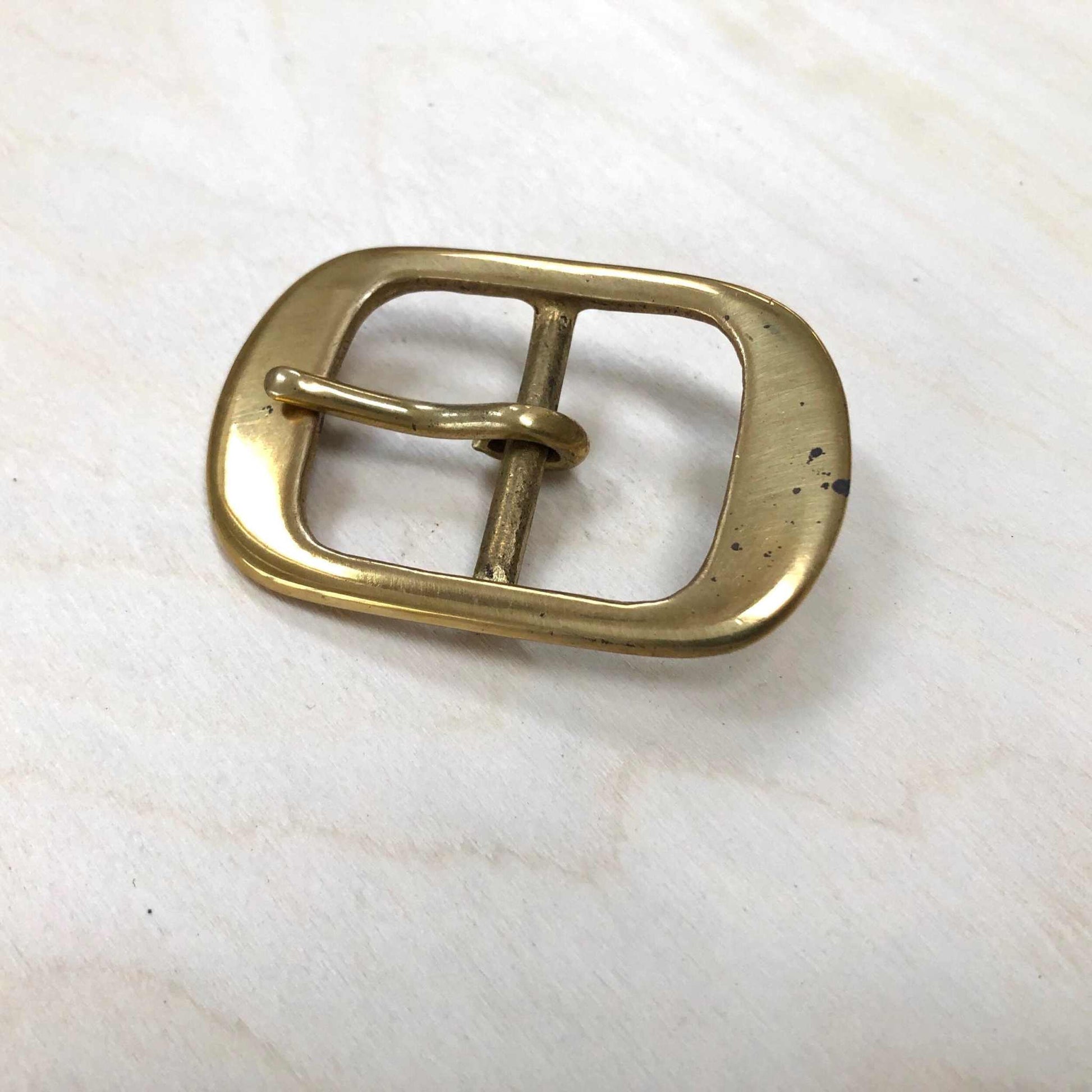 Solid brass belt buckle with double frame and pin, for bespoke leather projects.