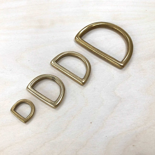 Solid brass D-rings in various sizes for leather crafting and bespoke projects.